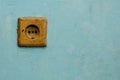 The Electric Socket on the Blue Wall Royalty Free Stock Photo