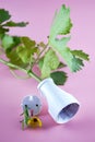 an electric socket with a plant stem instead of a cable next to an electric plug with plants and flowers conception