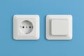 Electric socket and switch on blue wall. 3d rendering illustration Royalty Free Stock Photo