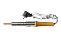 Electric soldering iron with a chisel tip, wooden handle and coiled electric wire, isolated on a white background with a clipping