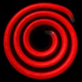 Electric spiral heated to a red. Heating coil element Royalty Free Stock Photo