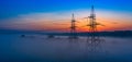 Morning Silhouettes: Power Lines Dance Against the Dawn Sky Royalty Free Stock Photo