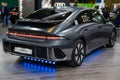 electric supercar Hyundai Ioniq 6 premiere at a motor show, 2023 model, rear view