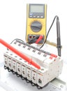 Electric switch on the control panel and multimeter Royalty Free Stock Photo