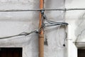 electric and telephone cables on the facade . Royalty Free Stock Photo