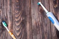 Electric Toothbrush on a black wooden background Royalty Free Stock Photo