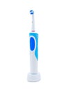 Electric toothbrush standing upright isolated on a white background Royalty Free Stock Photo