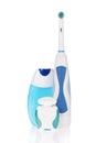 Electric toothbrush, toothpaste and dental floss Royalty Free Stock Photo
