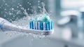Electric toothbrush with toothpaste and water splashes in a bright bathroom setting Royalty Free Stock Photo