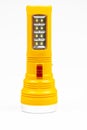 An electric torch of yellow is isolated on a white background Royalty Free Stock Photo