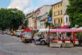 Electric tourism tour buggies parked at Szeroka street and square, Kazimierz, Jewish Quarter, Krakow, Poland Royalty Free Stock Photo