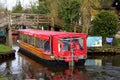 Electric tourist canal boat in the Dutch village canals of Giethoorn