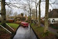 Electric tourist canal boat in the Dutch village canals of Giethoorn