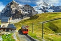 Electric tourist train and Eiger North face,Bernese Oberland,Switzerland Royalty Free Stock Photo