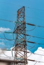 Electric tower or transmission or electricity hydro or pylon with blue Sky and clouds on background Royalty Free Stock Photo