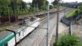 Electric Train Traveling Through a Scenic Urban Railway