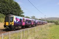 Electric train on West Coast Mainline in Cumbria Royalty Free Stock Photo