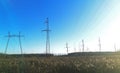 Electric transmission line. Power transmission pylon silhouette against blue sky at dusk. The concept of electrification Royalty Free Stock Photo