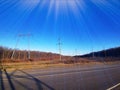 Electric transmission line. Power transmission pylon silhouette against blue sky at dusk. The concept of electrification Royalty Free Stock Photo