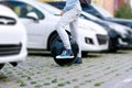 Electric transport compare to diesel fuel cars. Electric balancing unicycle Royalty Free Stock Photo