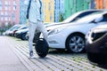 Electric transport compare to diesel fuel cars. Electric balancing unicycle Royalty Free Stock Photo