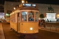 electric transport that runs on rails in the city of Lisbon at night