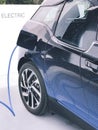 Electric vehicle being plugged in Royalty Free Stock Photo