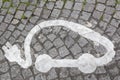 Electric vehicle charging station sign in parking cars on paved city road Royalty Free Stock Photo