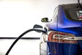 Electric Vehicle charging station system storing power on modern car. EV fuel for advanced hybrid car. automobile industry. Royalty Free Stock Photo