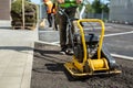 Electric vibrating roller, a machine for tamping the ground before planting a rolled lawn.