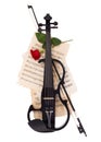 Electric violin, bow and red rose Royalty Free Stock Photo