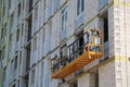 Electric winch on building under construction