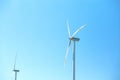 wind mill turbines with blue sky background Royalty Free Stock Photo