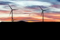 Electric wind turbines, backlighting Royalty Free Stock Photo