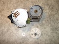 Electric wiper motor disassembled, with plastic wheel, vertical view