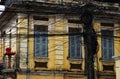 Electric wires in front of a colonial old house