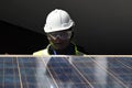 Electrical African American engineer working with electronic solar cells, mechanicals young men working with electrical equipment Royalty Free Stock Photo