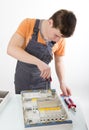 Electrical appliance repairs. electrician fixing Royalty Free Stock Photo
