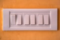 Beige rocker light switch with six buttons Royalty Free Stock Photo