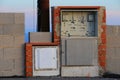 An electrical box at an abandoned construction site on the Mediterranean in the evening light. Royalty Free Stock Photo