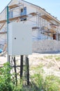 Electrical box. Electrical switchboard internal metal control box near house construction site outdoor Royalty Free Stock Photo