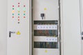 The electrical cabinet has a lot of bright buttons and switches Royalty Free Stock Photo