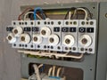 Electrical cabinet with old type fuses with wires