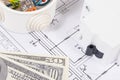 Electrical components using in electric installations, construction diagrams and dollar banknotes. Planning build or buy house Royalty Free Stock Photo