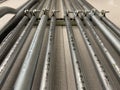 Electrical conduit for cable routing. Electrical metallic tubing in the building. Bending electrical conduits. Royalty Free Stock Photo