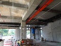 Electrical conduit, cable tray and aircond pipes as part of services above ceiling installed at the construction.