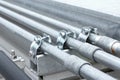 Electrical Conduit with Clamp Installation on Roof Royalty Free Stock Photo