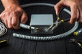 Electrical connection in the workshop of a master electrician. Close-up of hands of a master electrician during work. Installing a Royalty Free Stock Photo