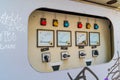 An electrical control cabinet is found on the side of the street. Royalty Free Stock Photo