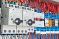 In the electrical control panel are circuit breakers protecting the motor and relay.